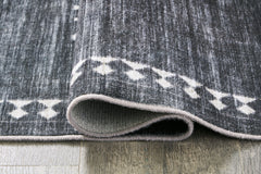Arloman - 5' x 7' Rug - Black / Cream / Gray