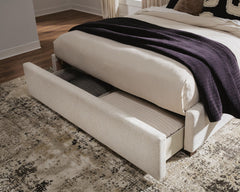 Shoralli - Queen Upholstered Storage Bed - Beige